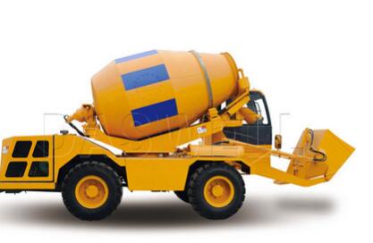 Self loading concrete mixer